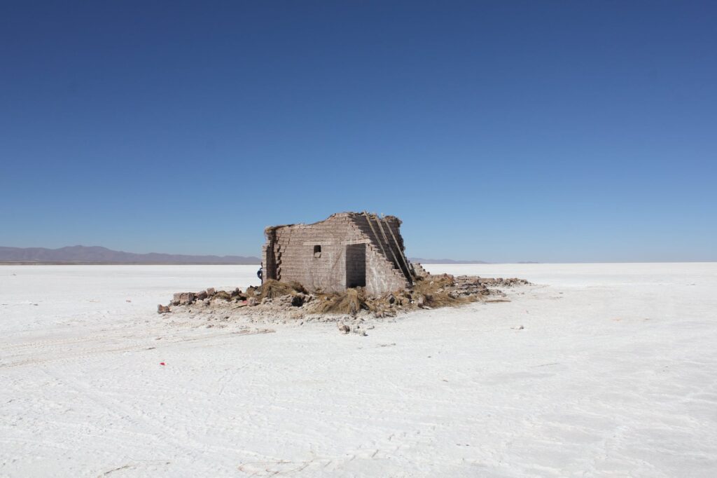 house ruins in desert landscape